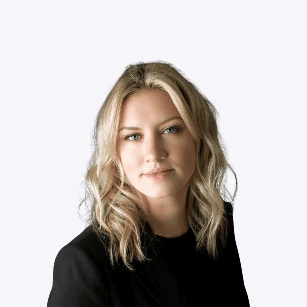 Portrait of Courtney, a professional stylist at Fusion Salon Avalon, showcasing their expertise and style.