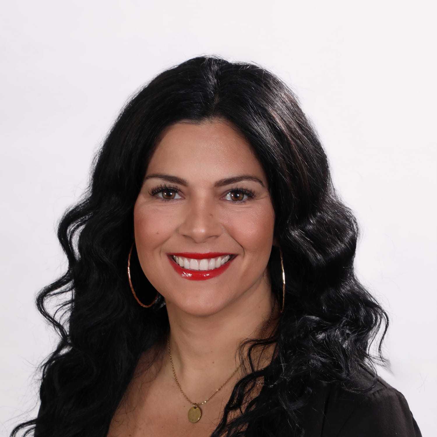 Portrait of Jessica, a professional stylist at Fusion Salon Avalon, showcasing their expertise and style.