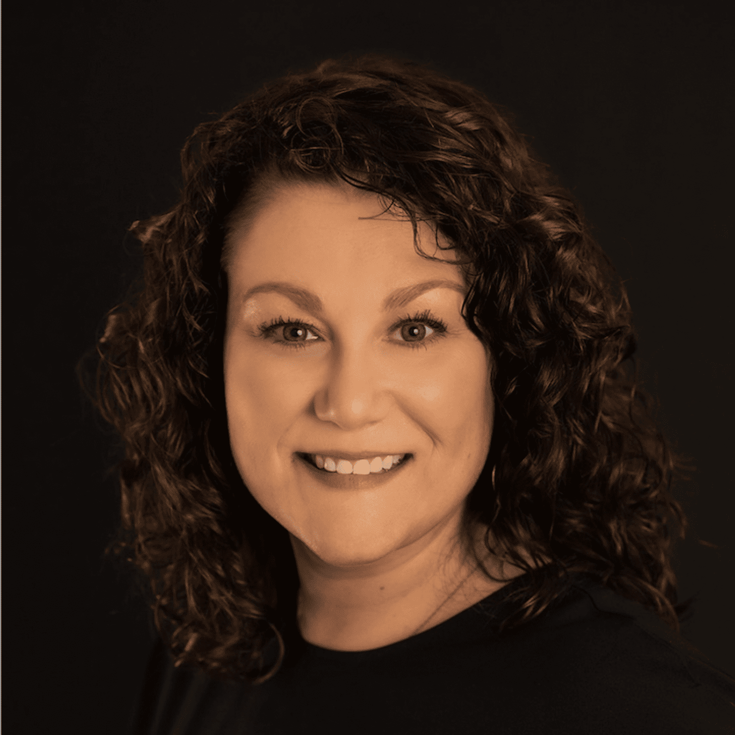 Portrait of Monica, a professional stylist at Fusion Salon Avalon, showcasing their expertise and style.