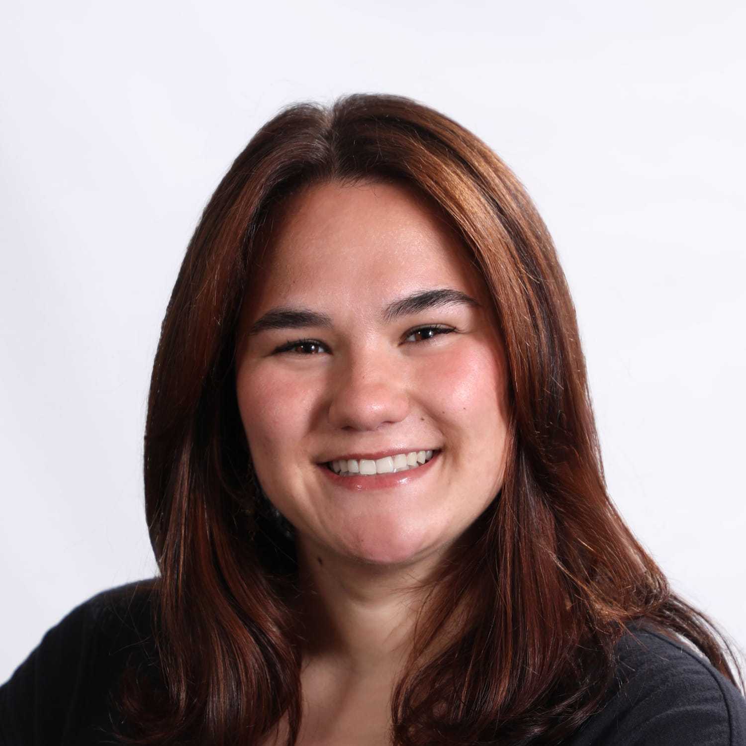Portrait of Marina, a professional stylist at Fusion Salon Avalon, showcasing their expertise and style.
