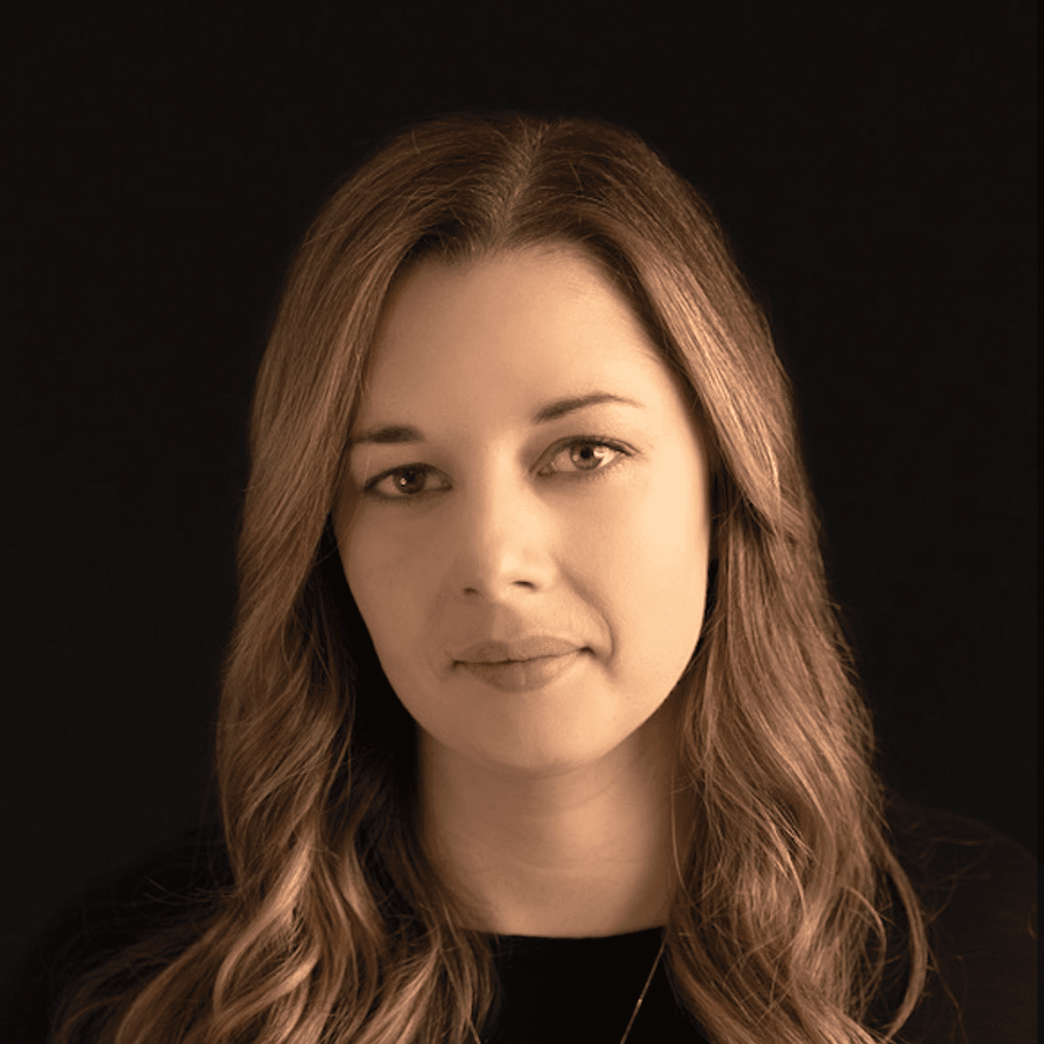 Portrait of Karylin, a professional stylist at Fusion Salon Avalon, showcasing their expertise and style.