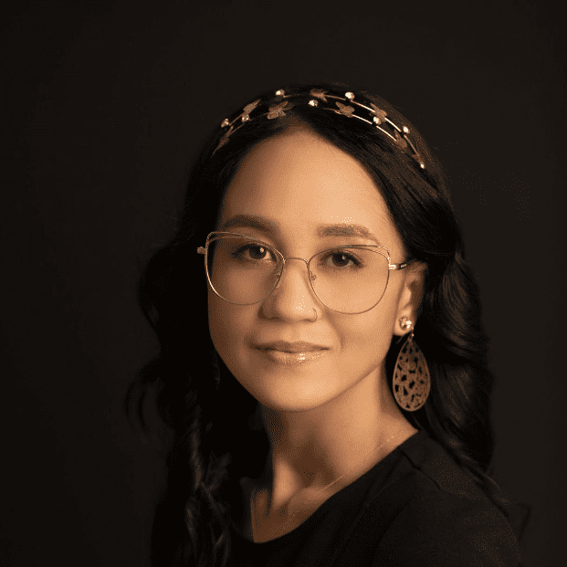 Portrait of Mariah, a professional stylist at Fusion Salon Avalon, showcasing their expertise and style.