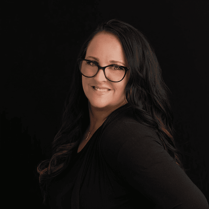 Portrait of Trish, a professional stylist at Fusion Salon Avalon, showcasing their expertise and style.