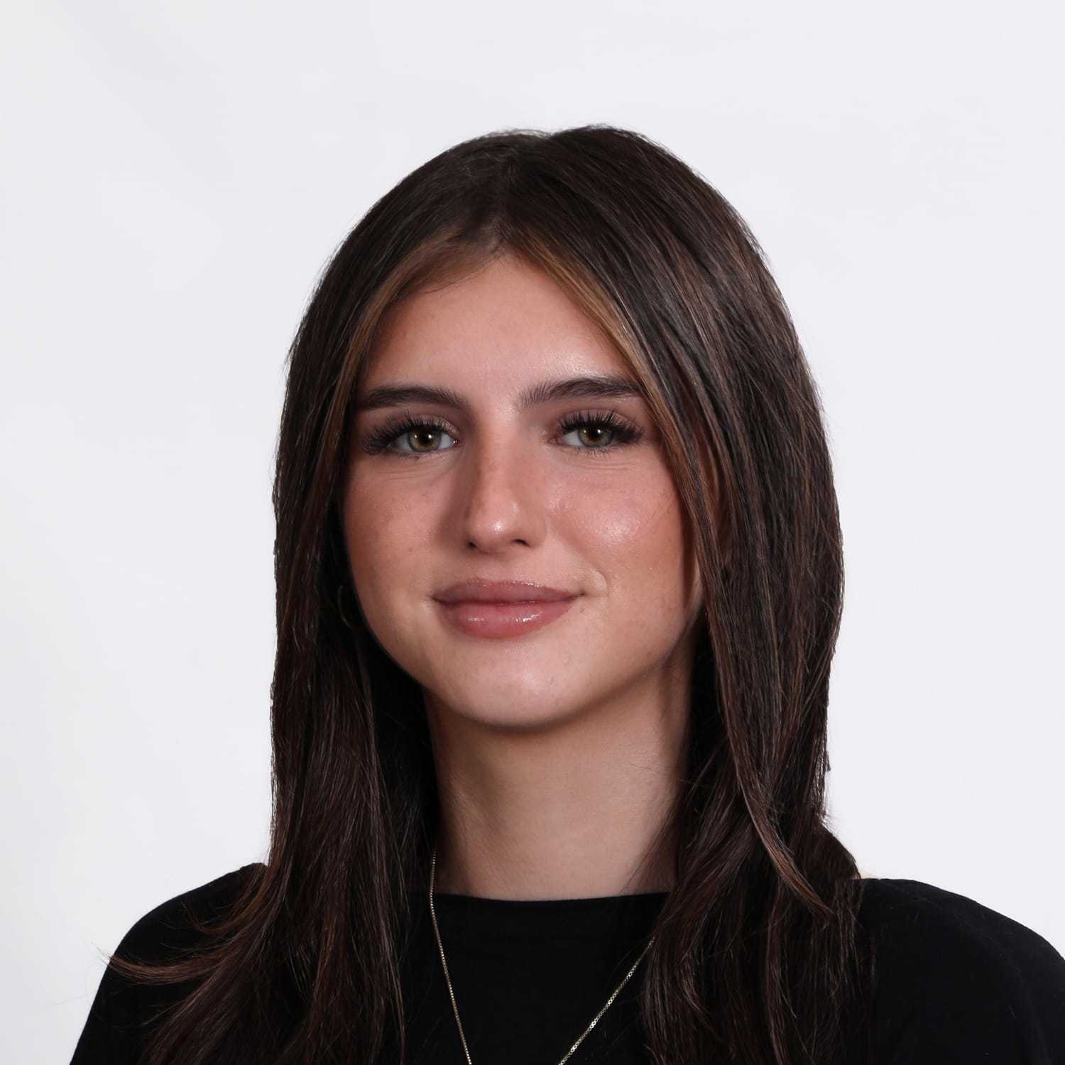 Portrait of Olivia, a professional stylist at Fusion Salon Avalon, showcasing their expertise and style.