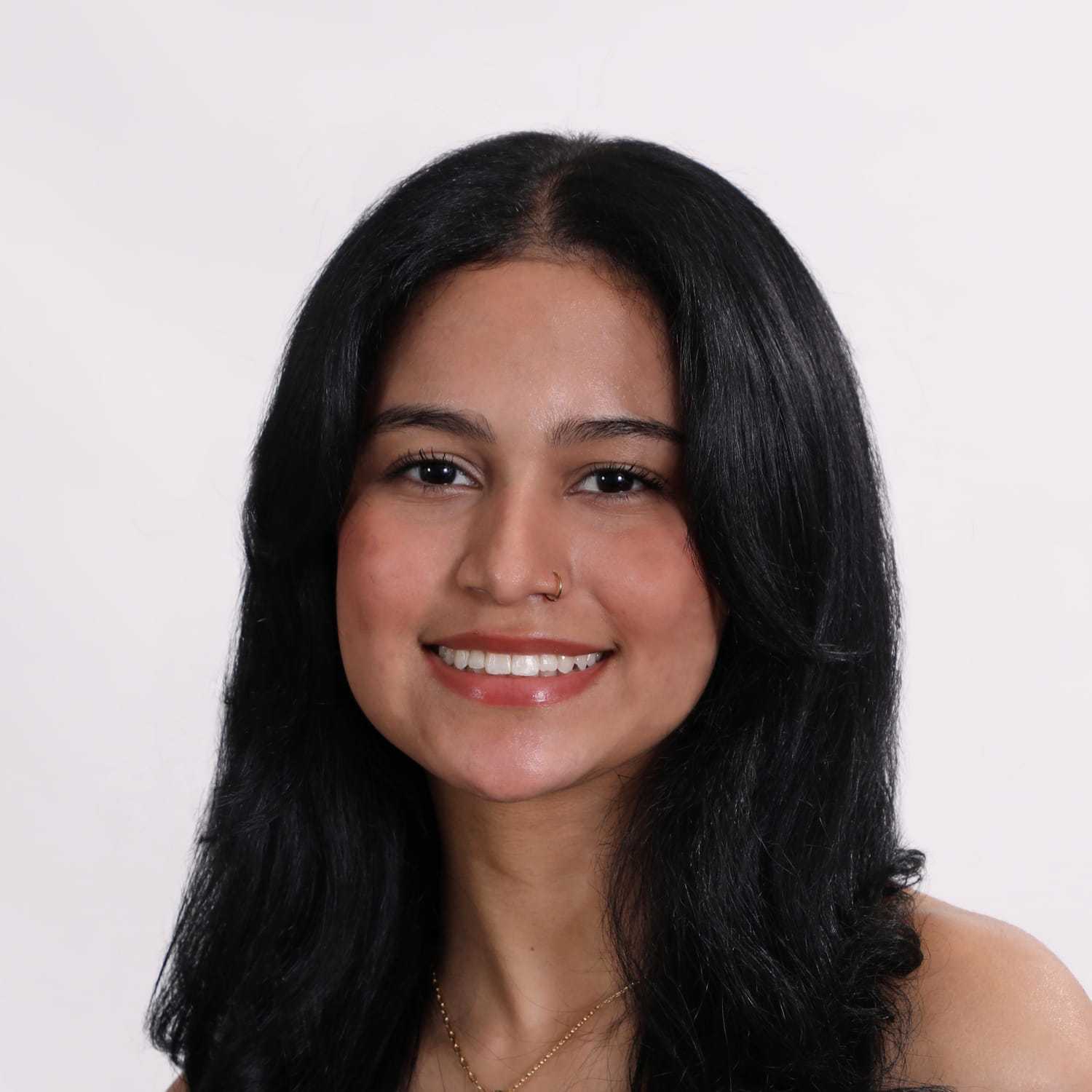 Portrait of Jaylene, a professional stylist at Fusion Salon Avalon, showcasing their expertise and style.